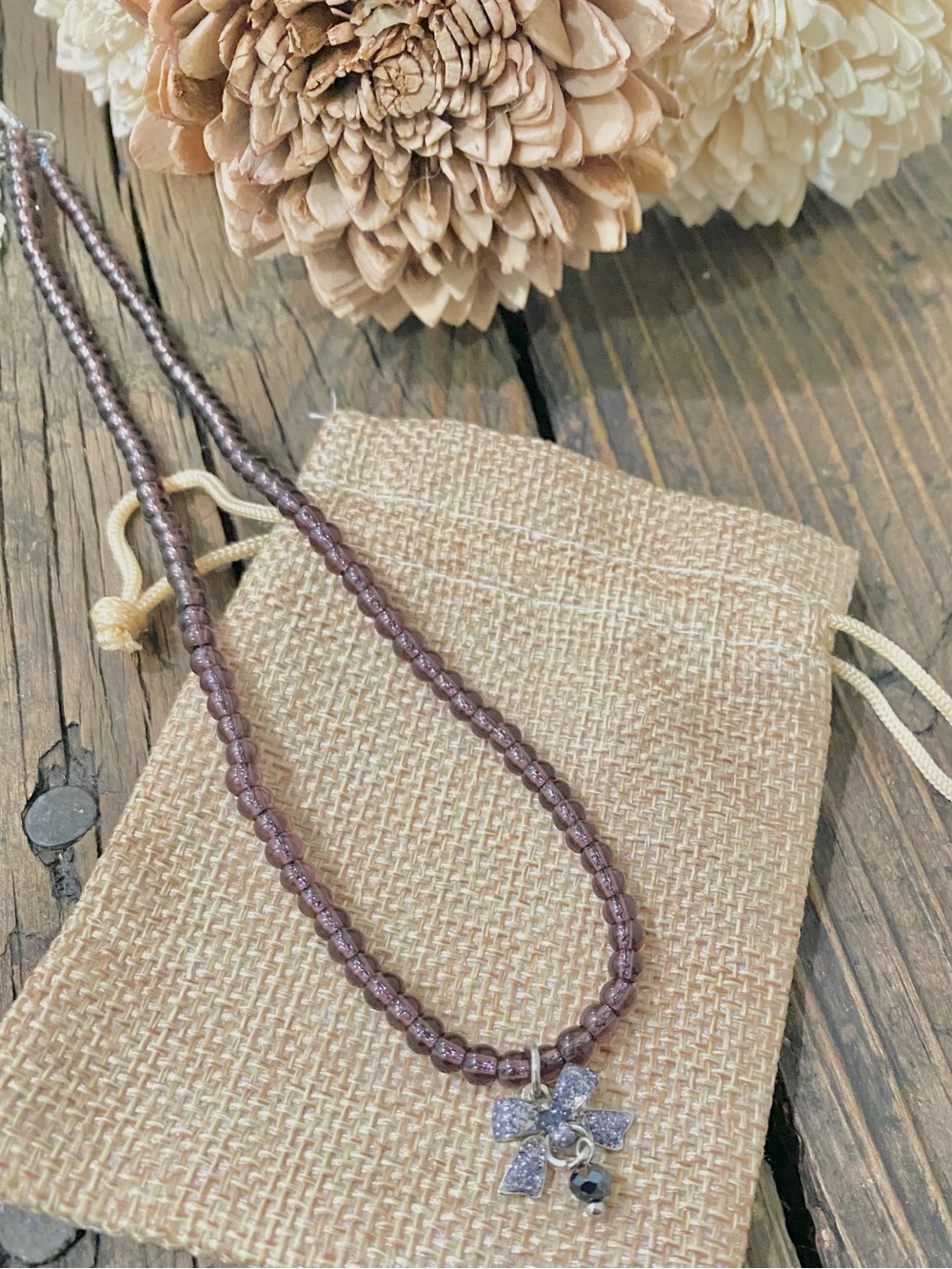 Plum Purple Beaded Necklace with Bow Pendant